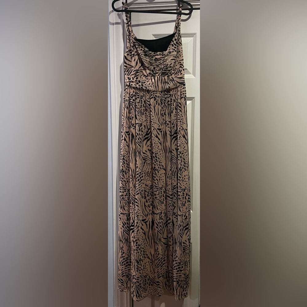 Long light pink dress with designs